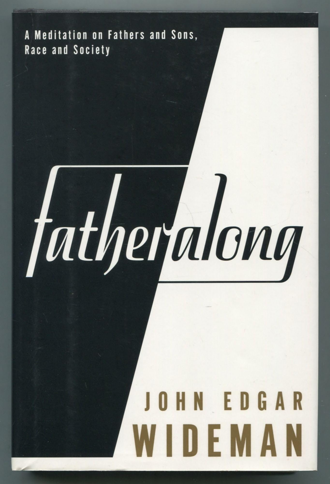 Fatheralong: A Meditation on Fathers and Sons, Race and Society book cover