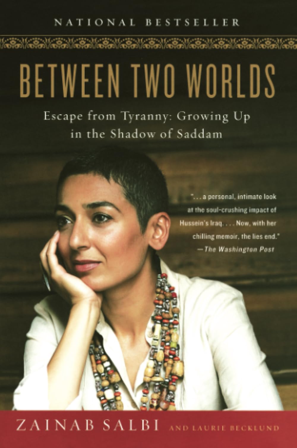 Between Two Worlds: Escape from Tyranny: Growing Up in the Shadow of Saddam book cover