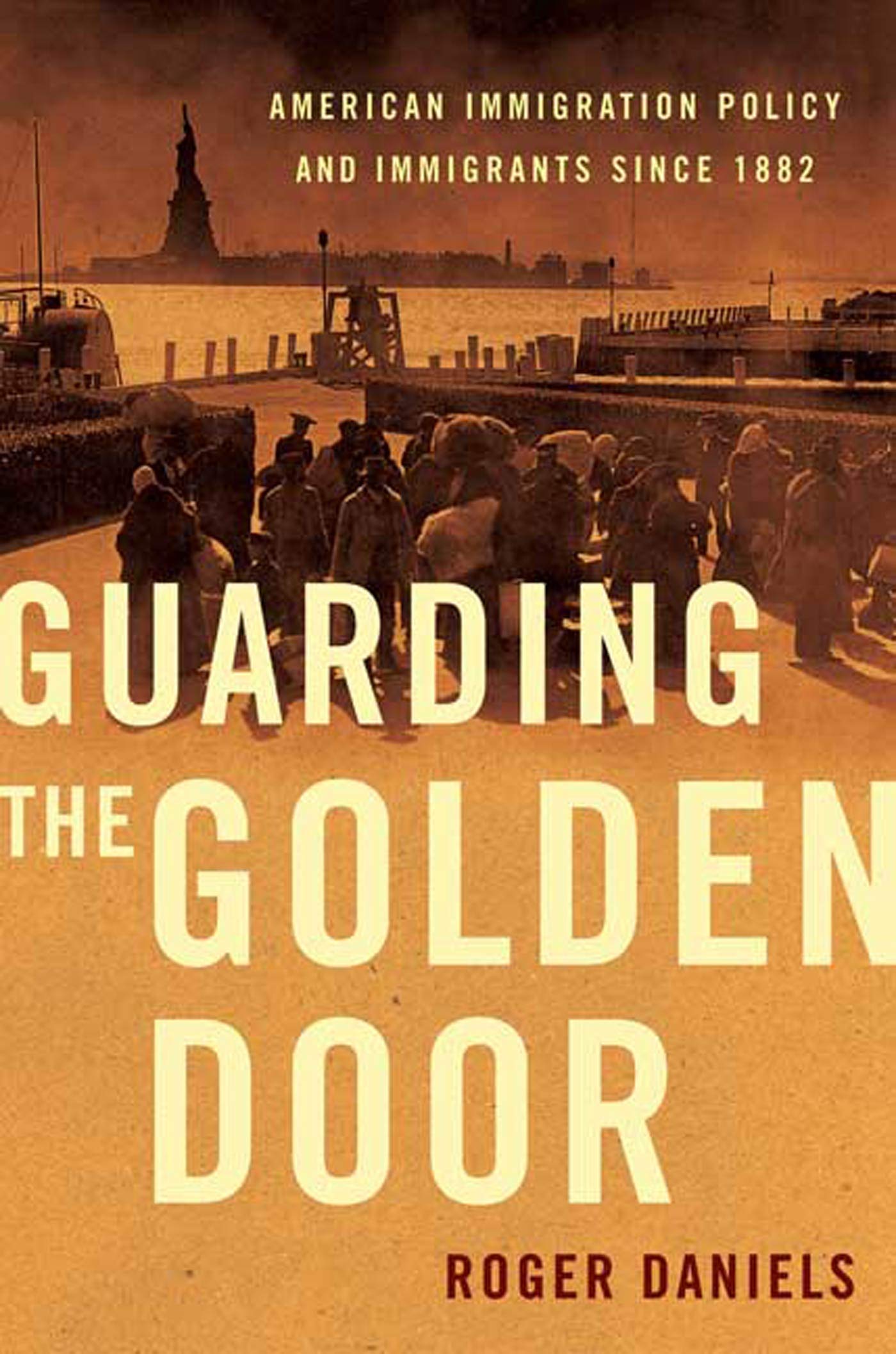 Guarding the Golden Door: American Immigration Policy and Immigrants Since 1882 book cover