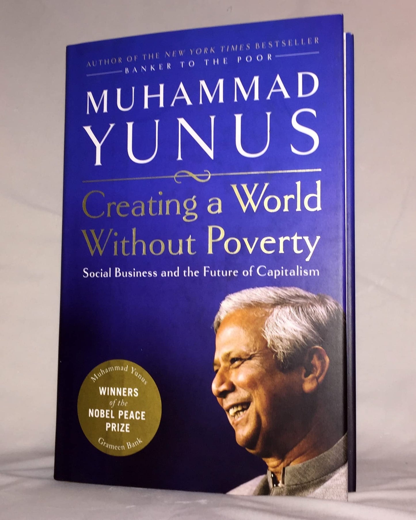 Creating a World Without Poverty: Social Business and the Future of Capitalism book cover