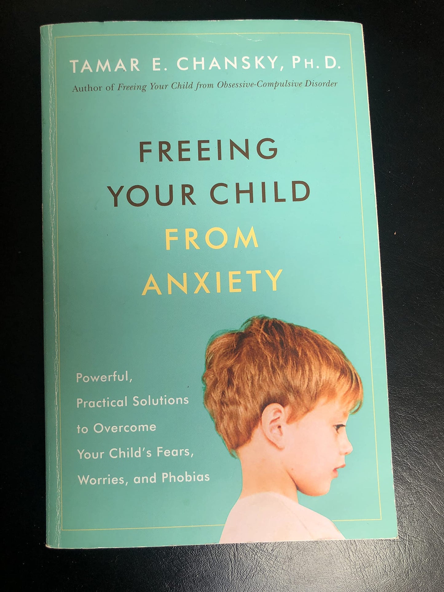 Freeing Your Child from Anxiety: Powerful, Practical Solutions to Overcome Your Child's Fears, Worries, and Phobias book cover
