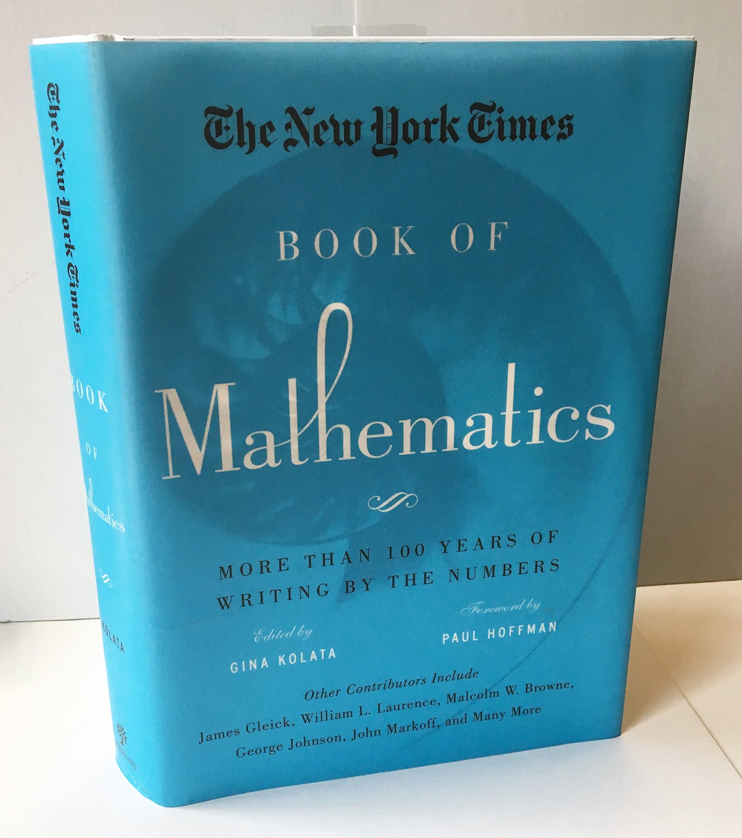 New York Times Book of Mathematics: More Than 100 Years of Writing by the Numbers book cover