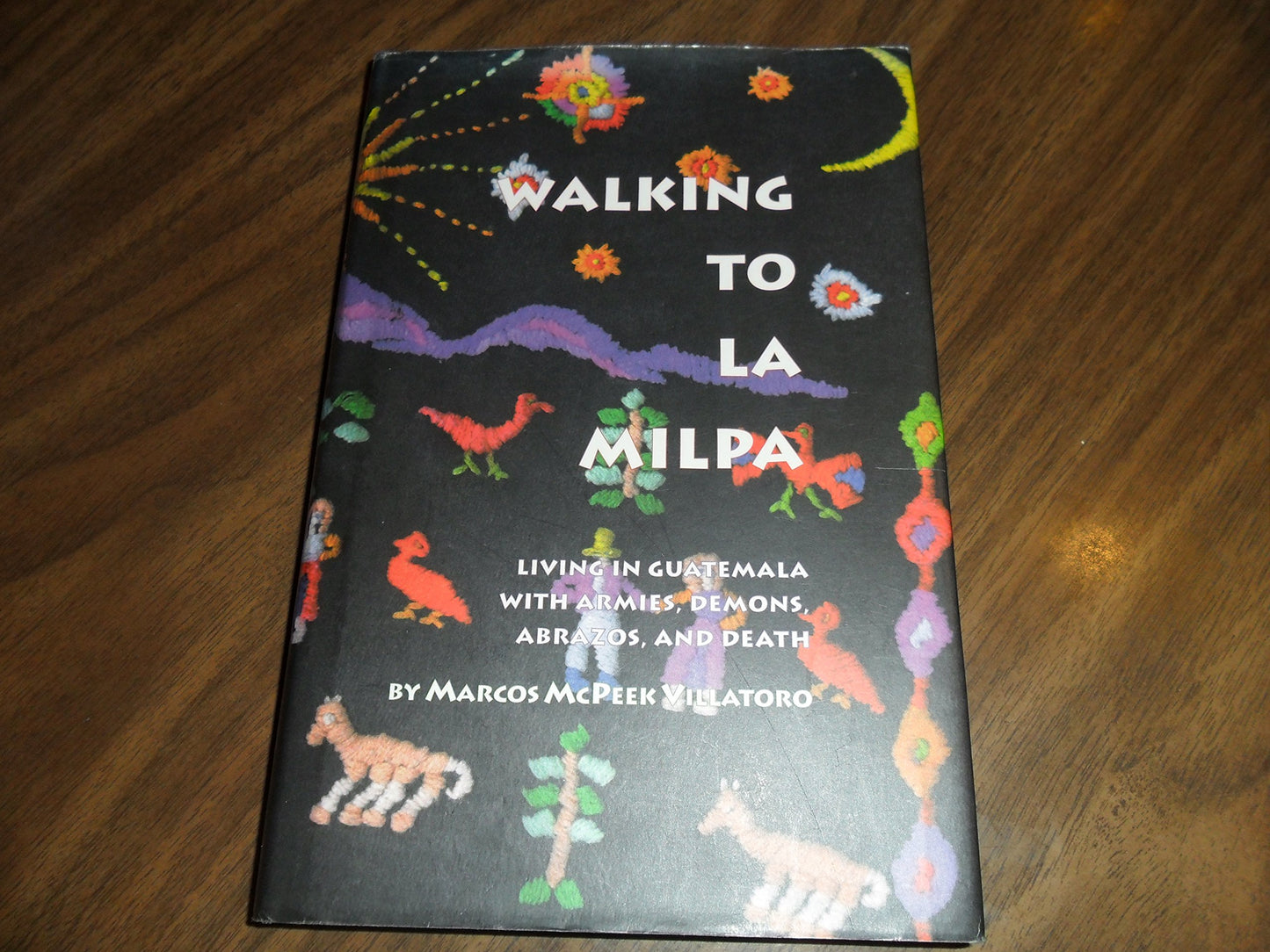 Walking to La Milpa: Living in Guatemala with Armies, Demons, Abrazos, and Death book cover