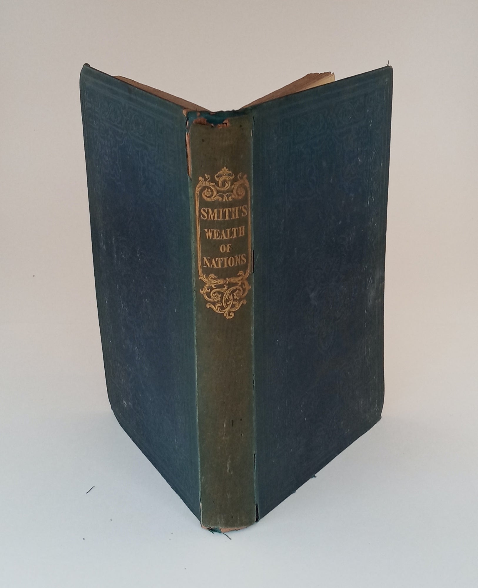 An Inquiry into the Nature and Causes of the Wealth of Nations. With a life of the author; complete in one volume. book cover