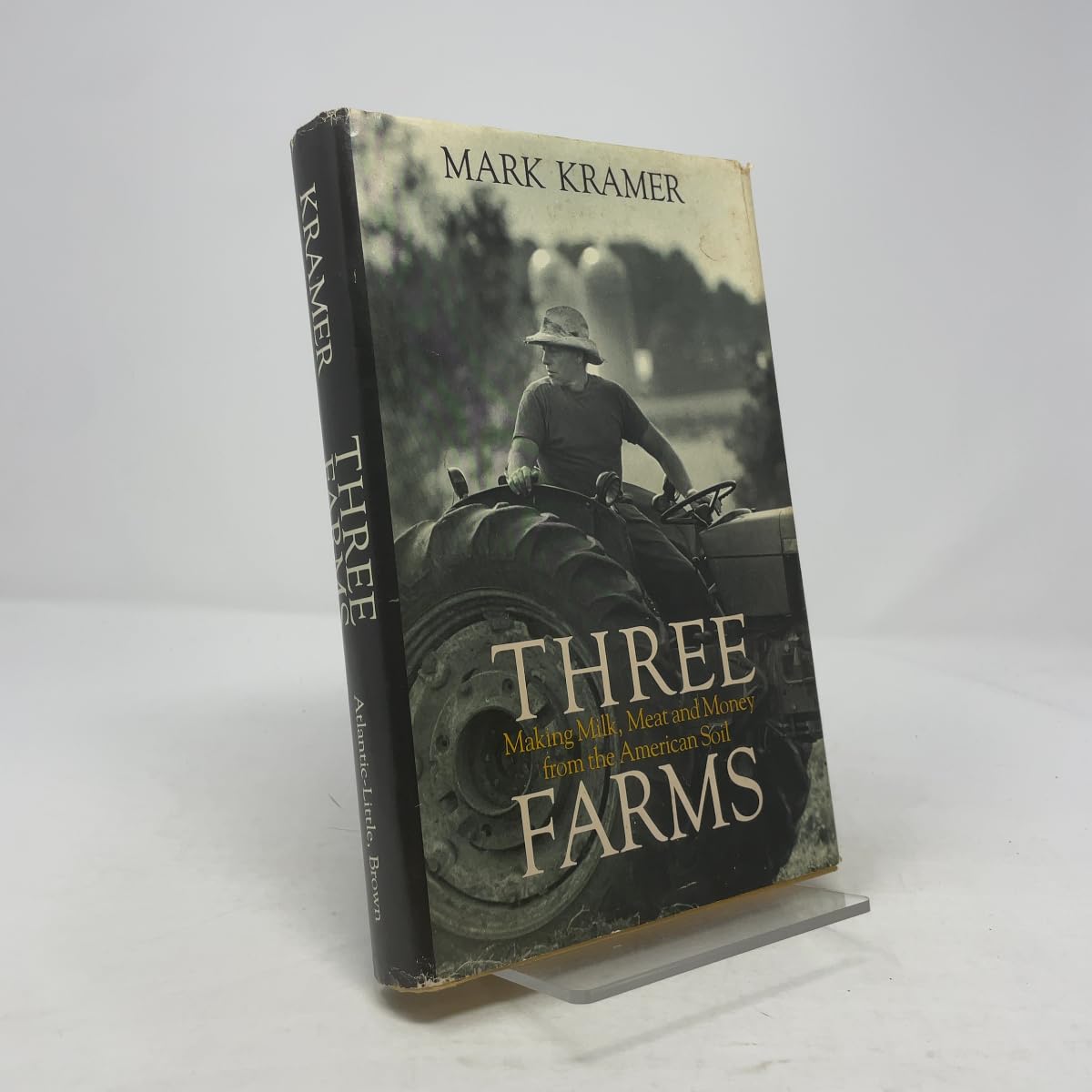 Three Farms: Making Milk, Meat and Money from the American Soil book cover