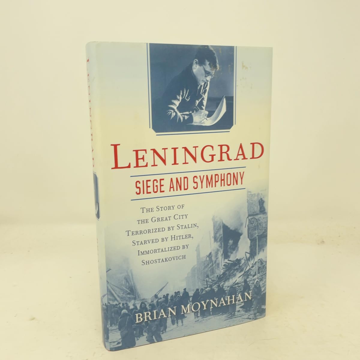 Leningrad: Siege and Symphony: The Story of the Great City Terrorized by Stalin, Starved by Hitler, Immortalized by Shostakovich book cover