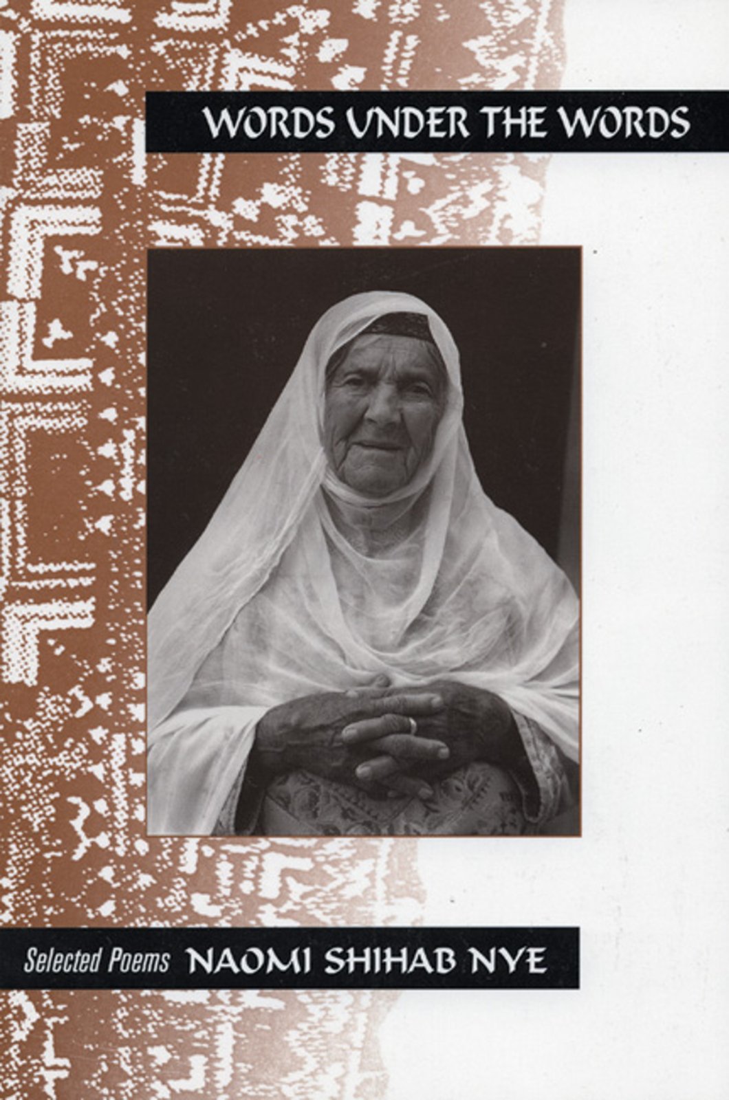 Words Under the Words: Selected Poems book cover