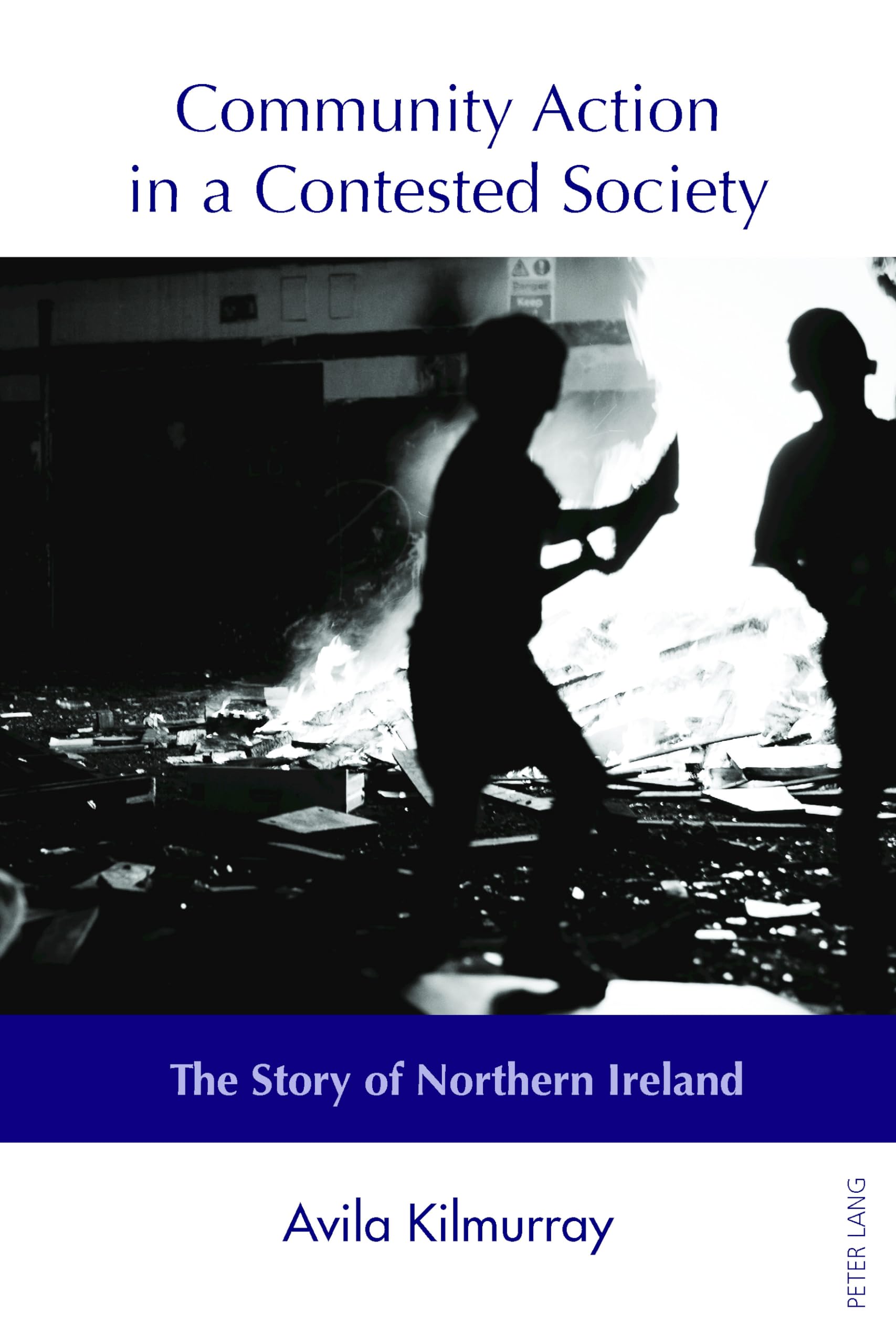 Community Action in a Contested Society: The Story of Northern Ireland book cover