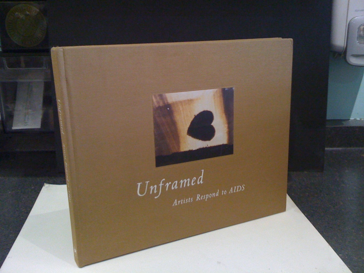 Unframed: Artists Respond to AIDS: A Chronicle of the Art Sales Benefiting the AIDS Community Research Initiative (Acria) 1993-2002 book cover