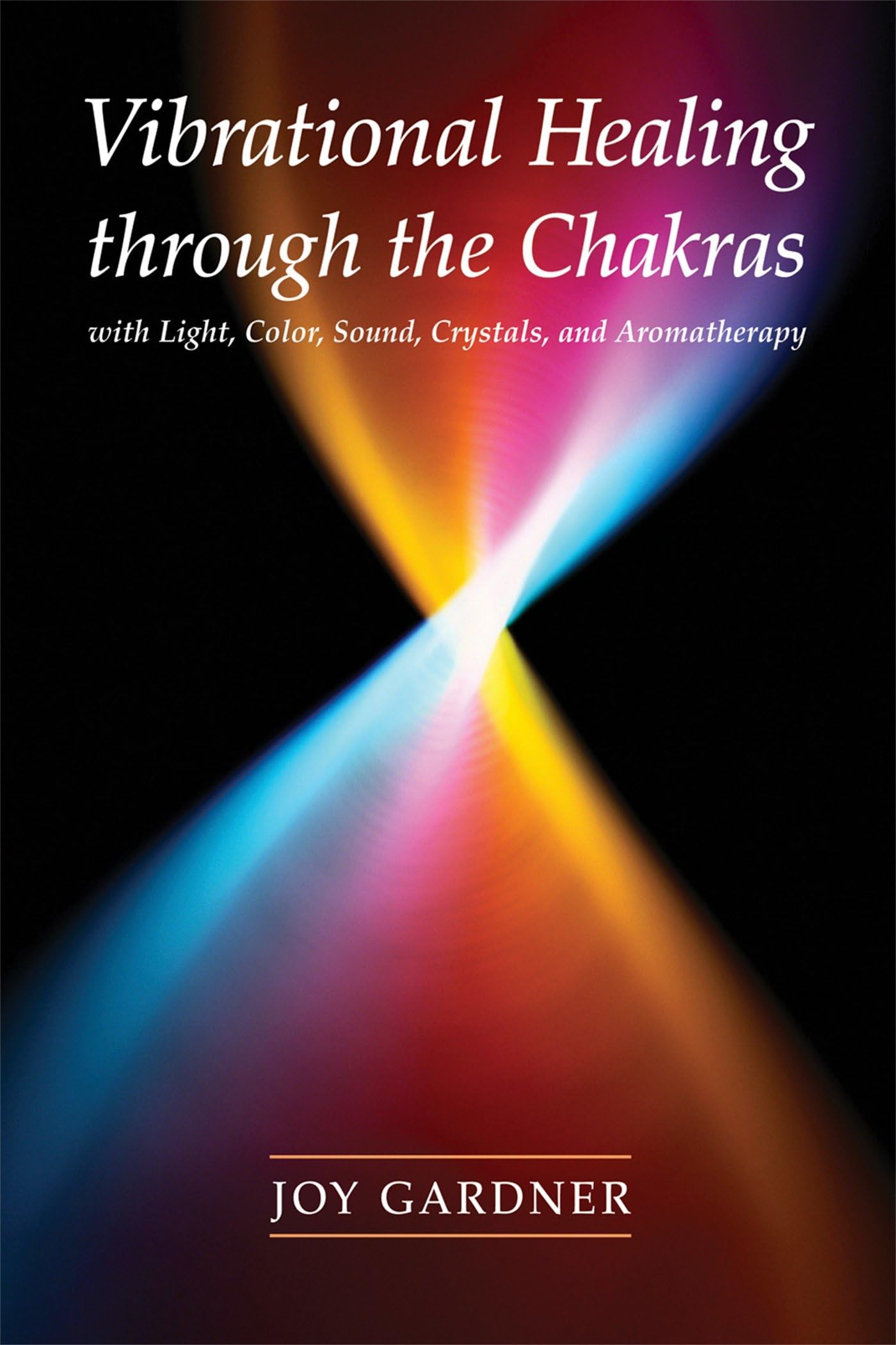 Vibrational Healing Through the Chakras: With Light, Color, Sound, Crystals, and Aromatherapy book cover