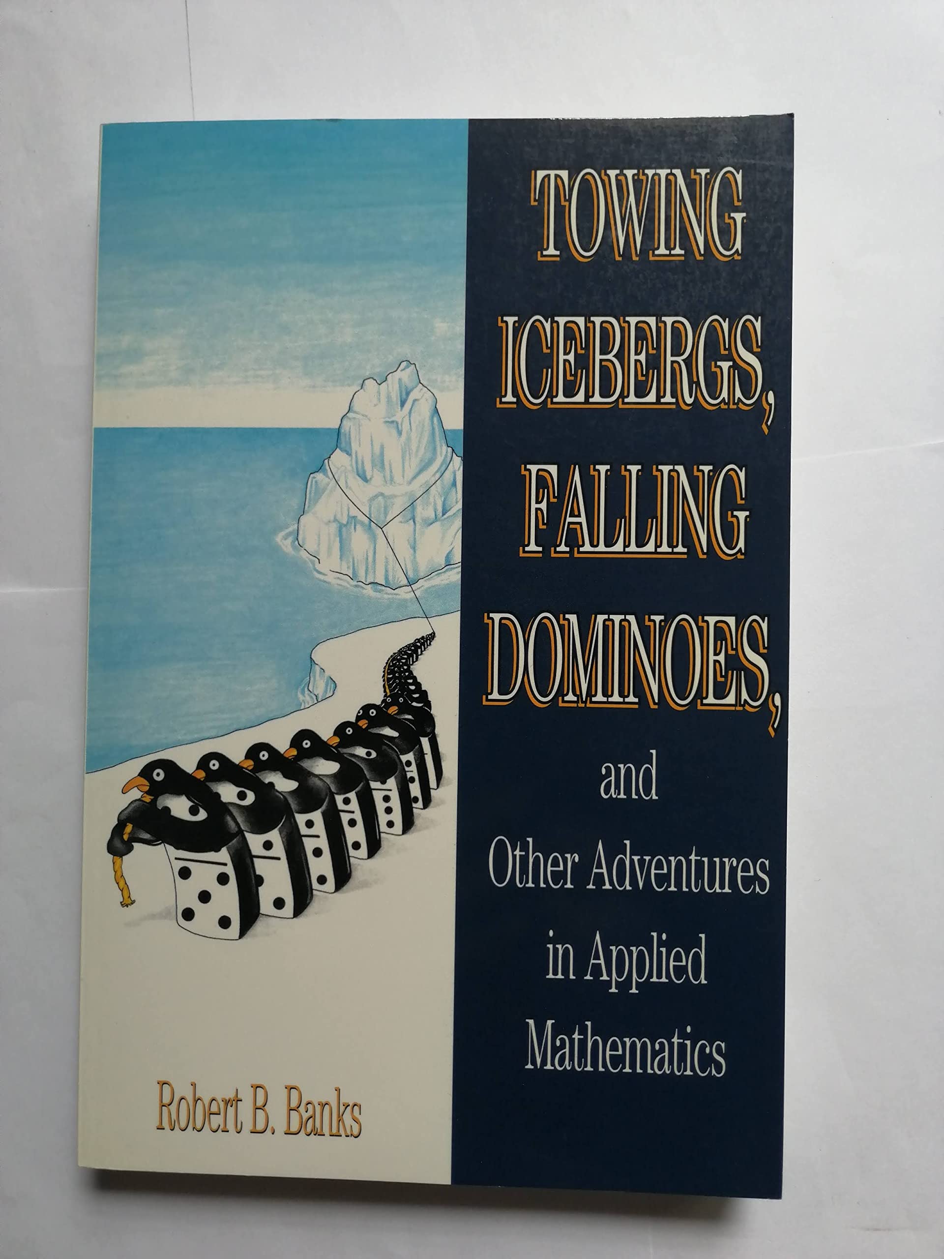 Towing Icebergs Falling Dominoes: And Other Adventures in Applied Mathematics book cover