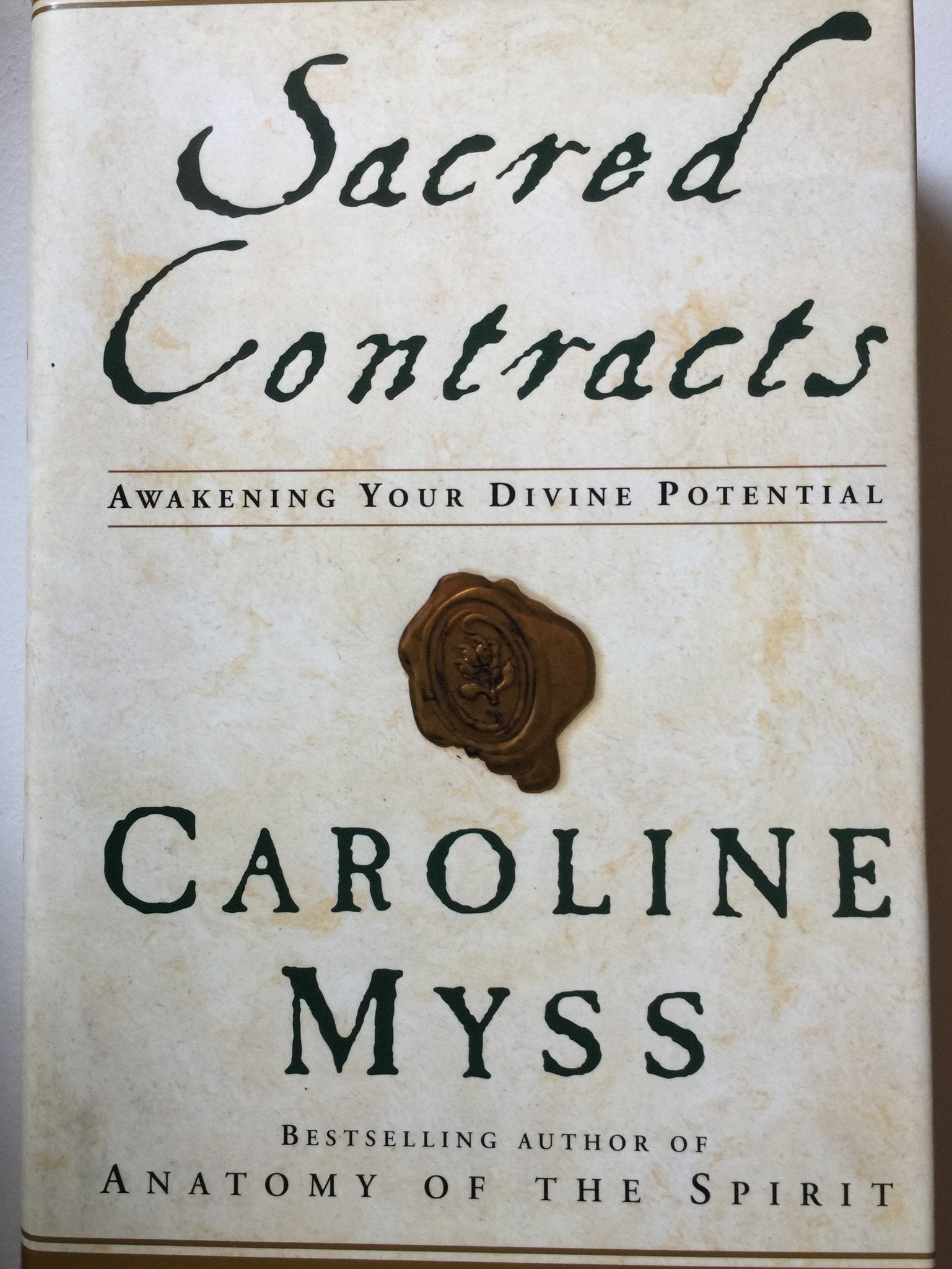 Sacred Contracts: Awakening Your Divine Potential book cover
