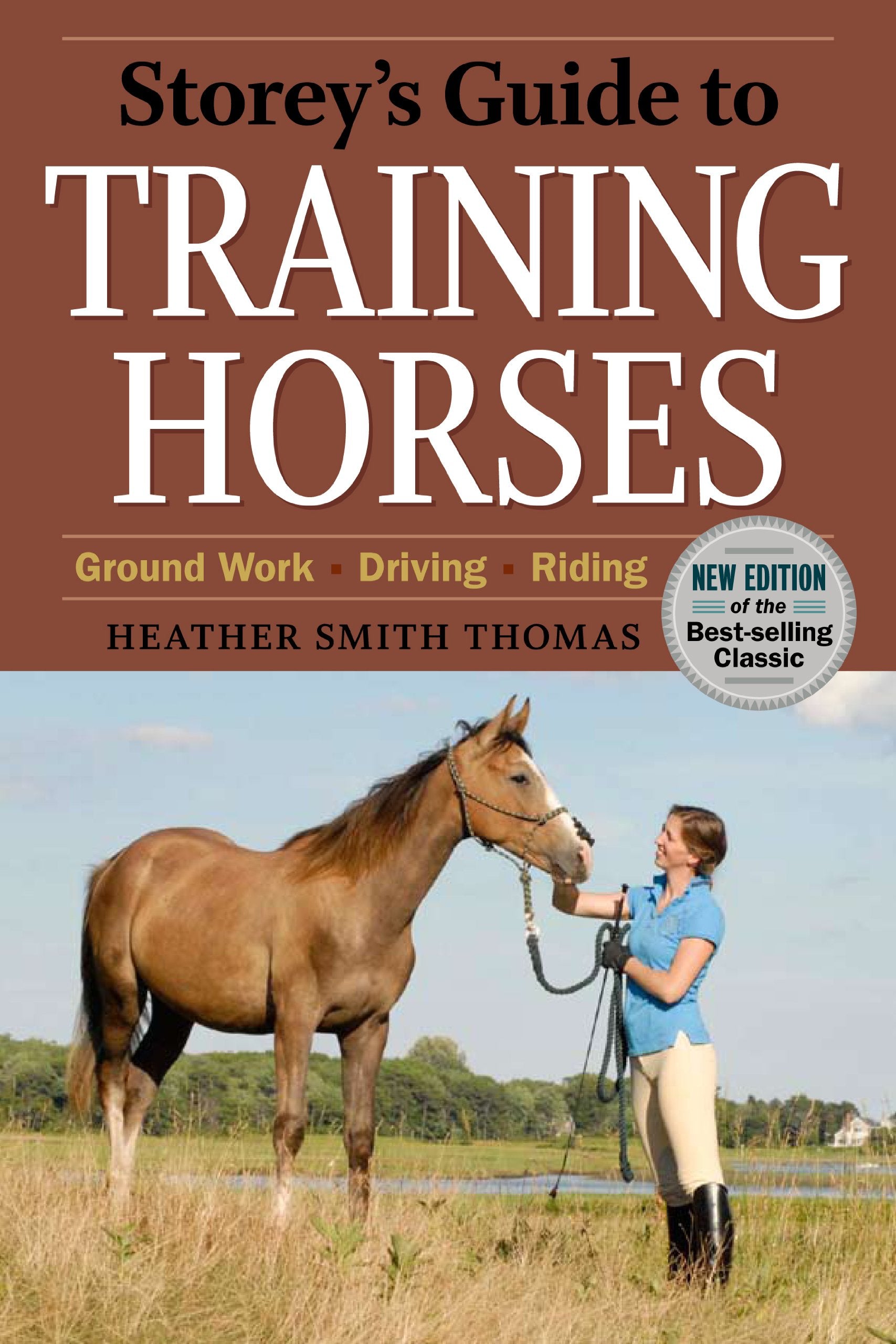 Storey's Guide to Training Horses book cover