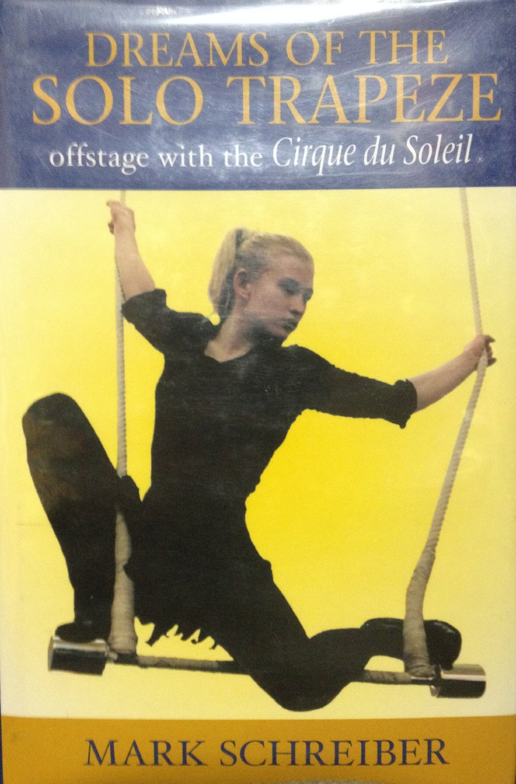 Dreams of the Solo Trapeze: Offstage with the Cirque Du Soleil book cover