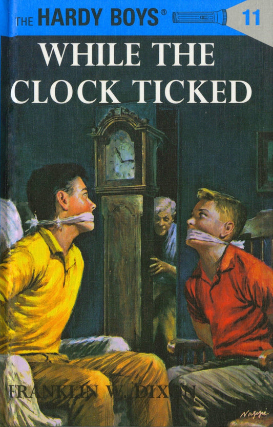 While the Clock Ticked (Hardy Boys, Book 11) book cover