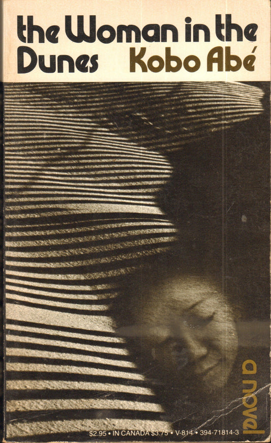 Woman in Dunes V814 book cover