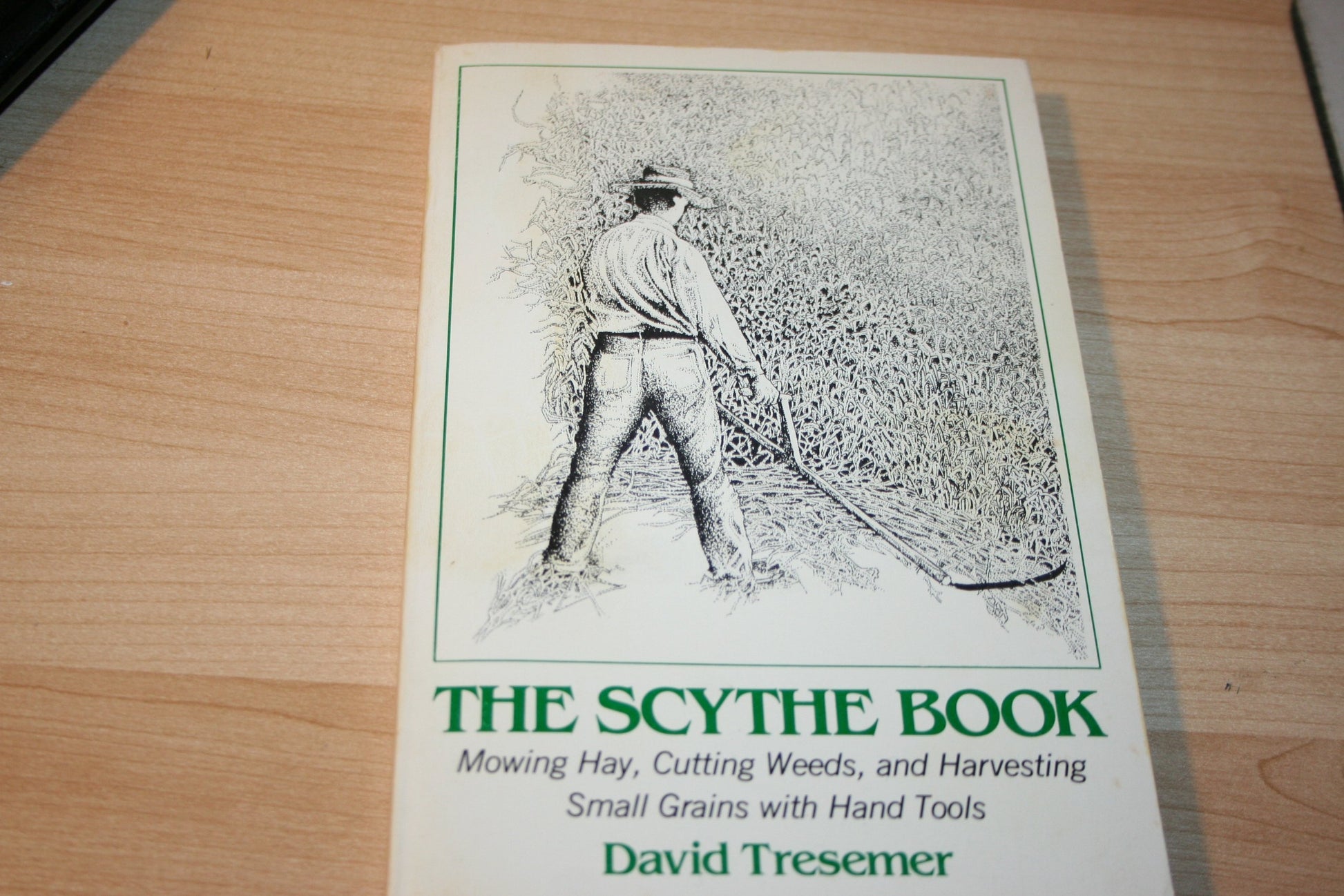 The Scythe Book: Mowing Hay, Cutting Weeds, and Harvesting Small Grains with Hand Tools book cover