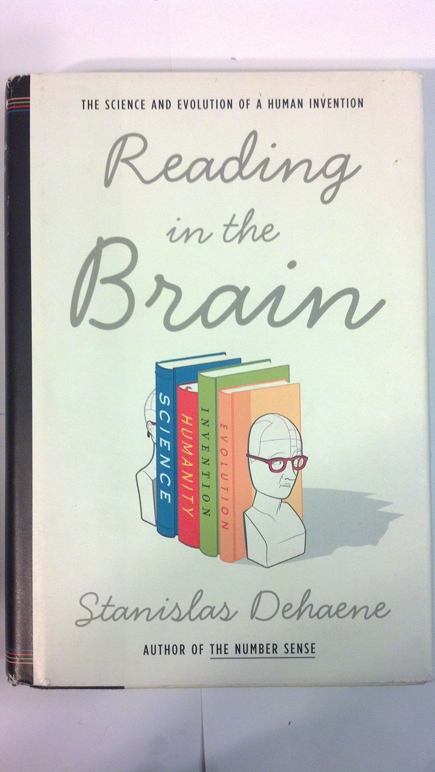 Reading in the Brain: The Science and Evolution of a Human Invention book cover