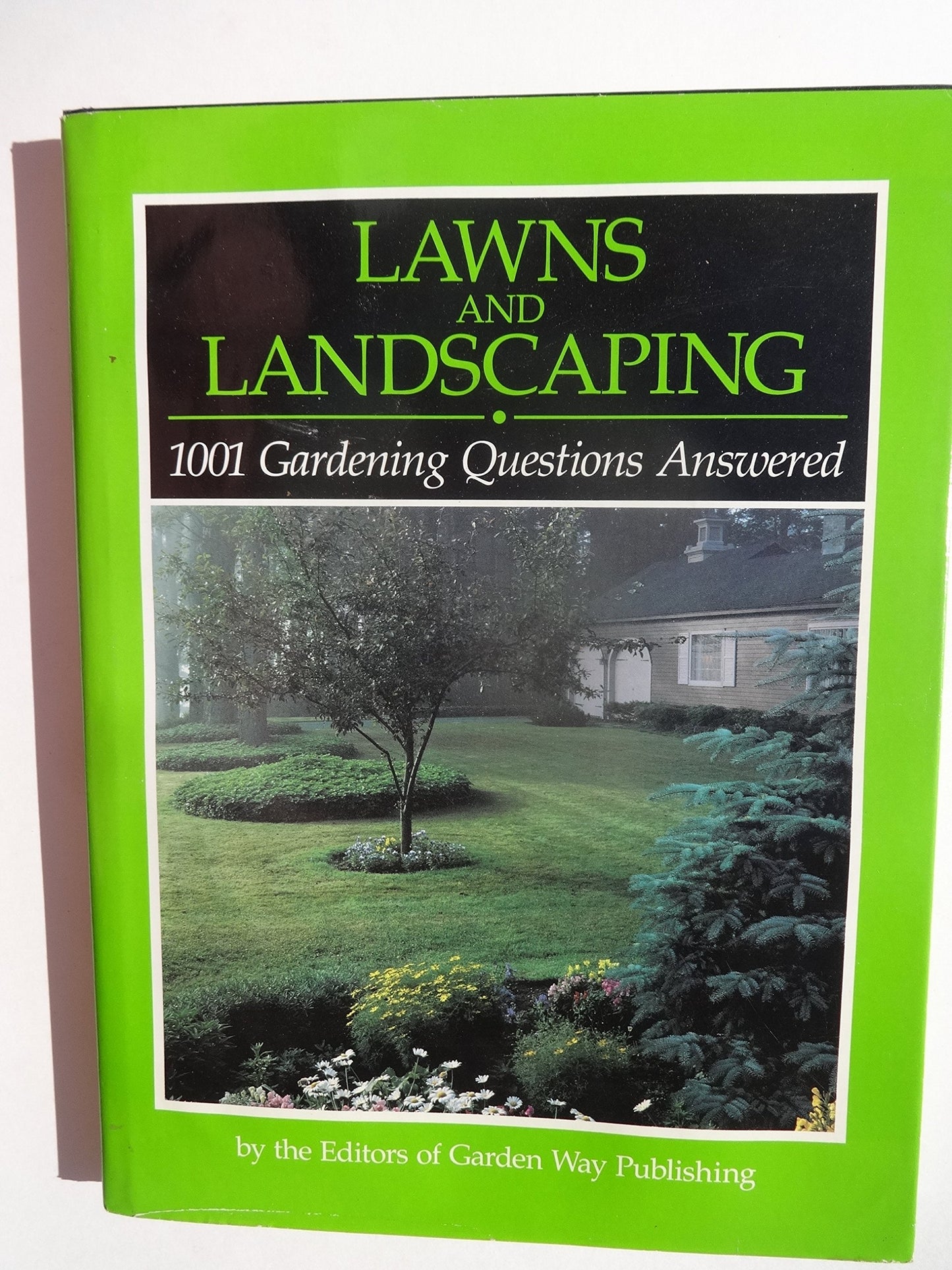 Lawns and Landscaping: 1001 Gardening Questions Answered book cover