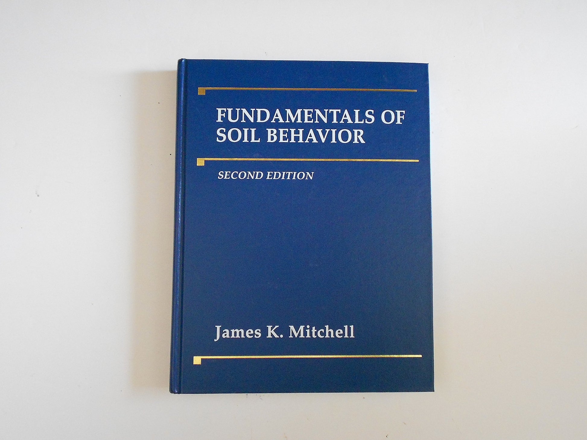 Fundamentals of Soil Behavior (Revised) book cover